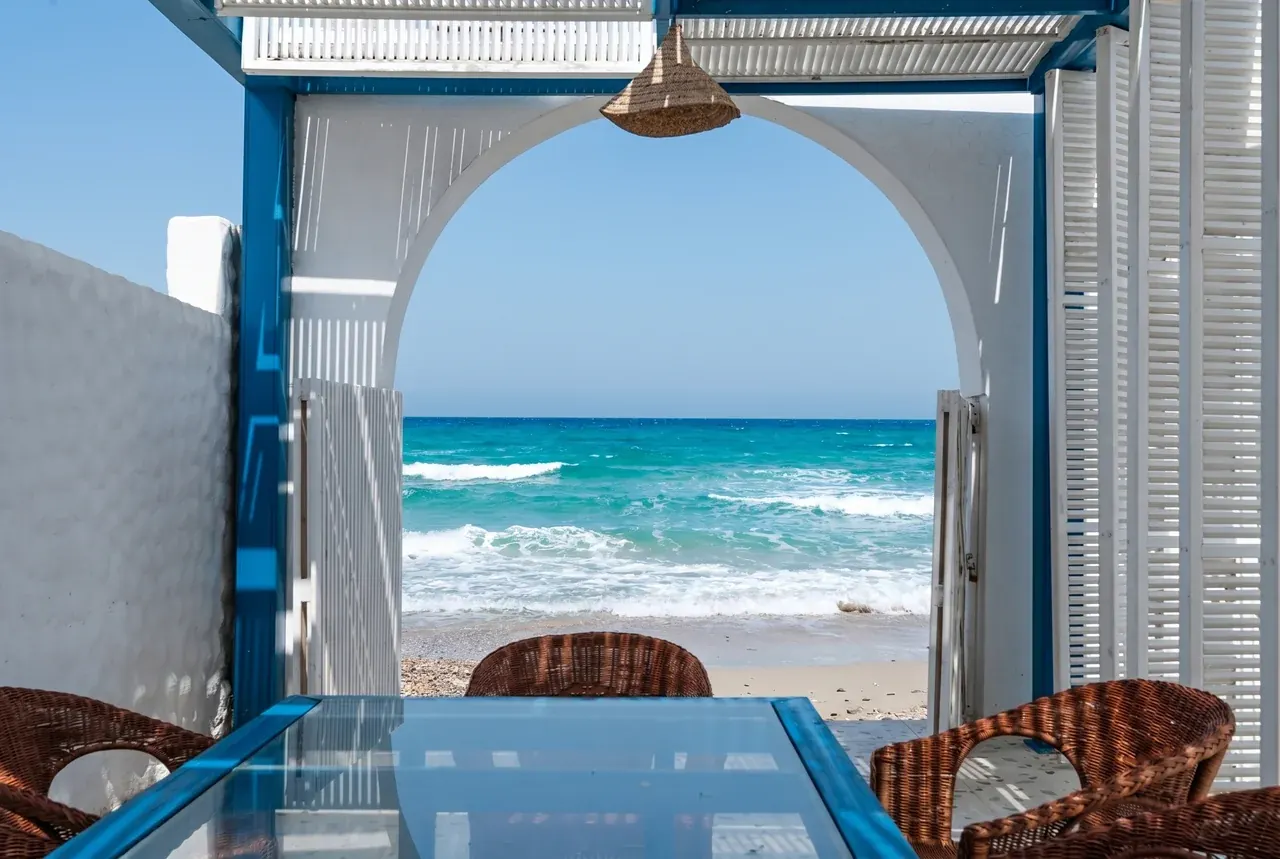 Mykonos-style arch opening to the sea