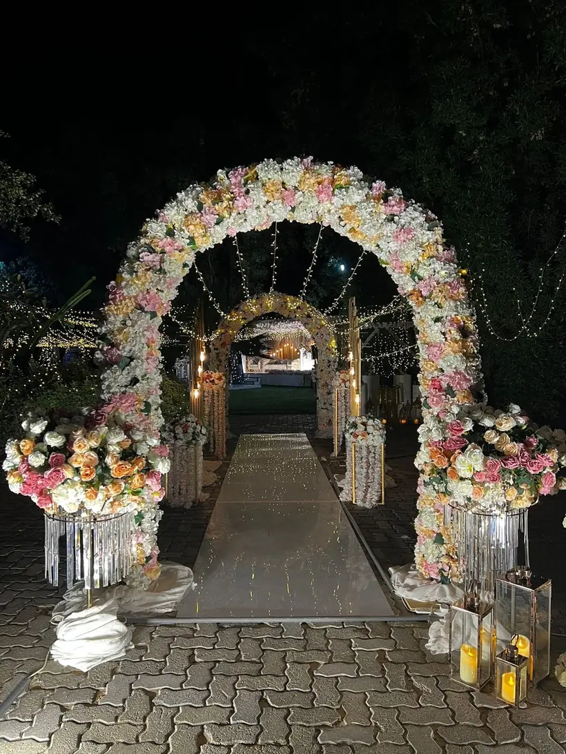 Flower arch for an evening celebration