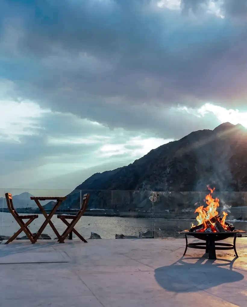 Bonfire on the terrace facing the sea and mountains