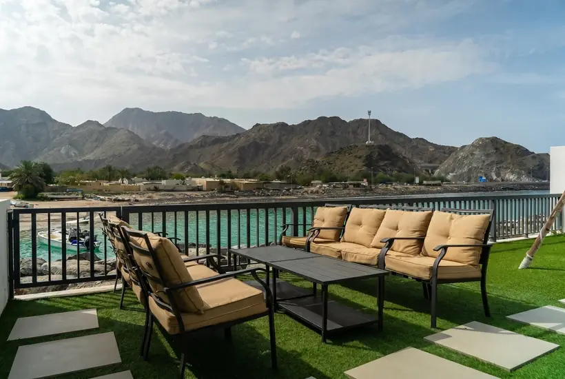 Terrace facing the bay and the mountains