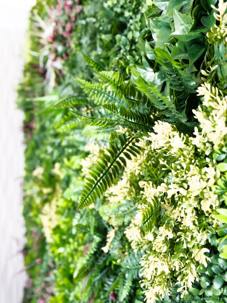 Lush botanical green wall at Jungle Breeze Villa. luxury holiday home in Dibba, Fujairah